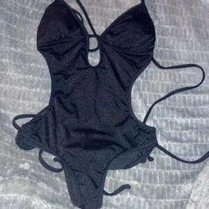 Black bathing suit with open back